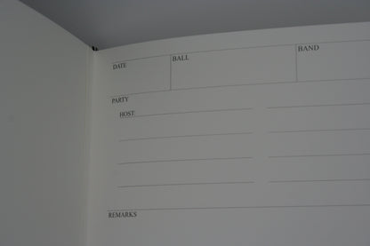 Close up of the writing section of the ballroom diaries, with areas to record the name of the ball, band, date, names of the guests and host and remarks about the ball.